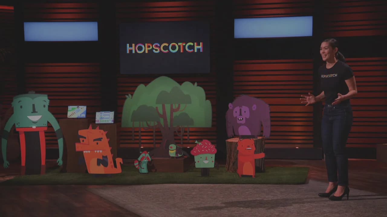 A preview image for the Shark Tank episode featuring Hopscotch, showing Samantha John and the Shark Tank logo
